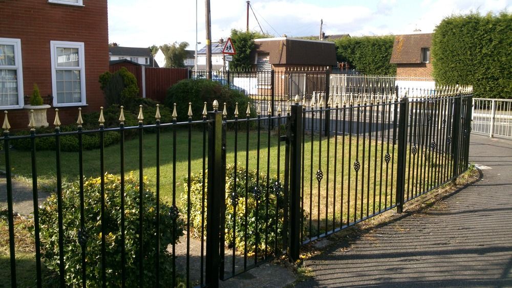 Black metal security railings with finials installed by Ryan Fencing